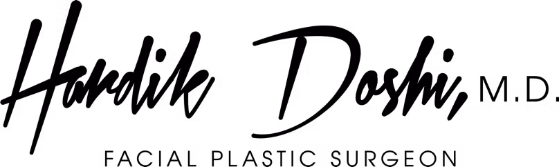 Doshi Plastic Surgery logo